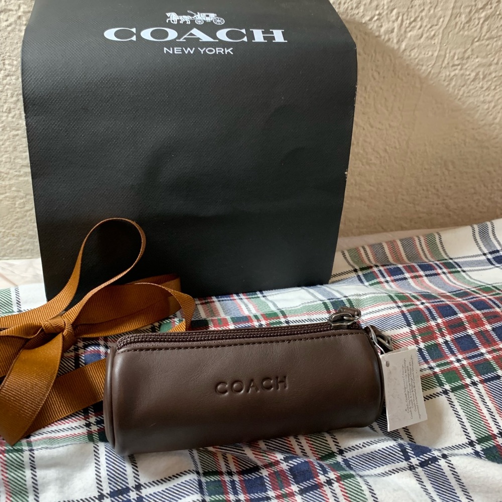 Coach golf ball holder